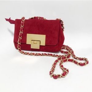 Stuart Weitzman. Mini rebel. Crossbody suede